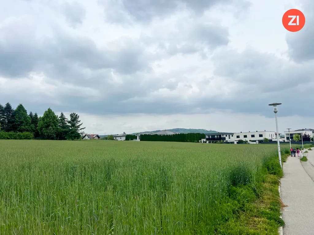Traumhaftes Baugrundstück in zentraler Paschinger Aussichtslage - Bild 1