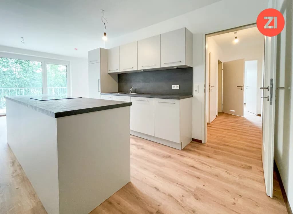 Geförderte 3-Zimmer-Wohnung mit Einbauküche und Tiefgaragenstellplatz - Bild 1